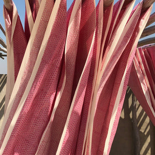 molly mahon hand block printed fabric hanging drying outside in warm breeze