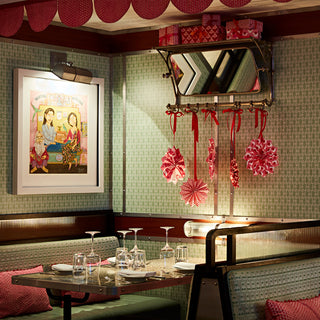 molly mahon hand blocked luna pink cushions decorate bombay restaurant with hand block printed paper decorations