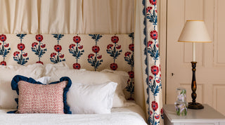 four poster bed decorated in Molly Mahon Dianthus hand block printed fabric
