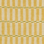 A close-up of a fabric pattern featuring vertical mustard yellow and cream stripes, accented by horizontal rows of small green and white semicircles.