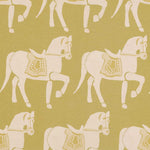 A repeating pattern of stylized cream-colored horses with decorative saddles on a muted olive-yellow background.