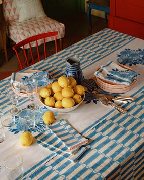 Molly Mahon block print tablecloths, napkins and tbale runners in her new collection 'Neapolitan' featuring Peonies, and her signature geometric print Luna in pastels and blues.