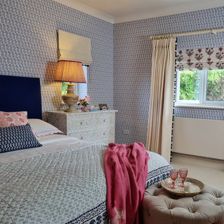 molly mahon lani wallpaper design set in a double bedroom with dianthus hand block printed curtain blind and various cushions used for one of sophie robinsons reveal television show
